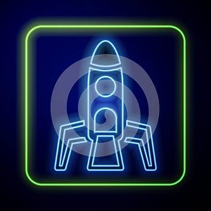 Glowing neon Rocket ship icon isolated on blue background. Space travel. Vector