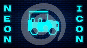 Glowing neon Safari car icon isolated on brick wall background. Vector