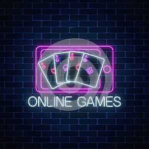 Glowing neon sign of online games application in mobile device screen. Casino bright signboard.