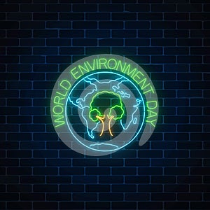Glowing neon sign of world environment day with tree symbol in globe. Earth day neon banner.