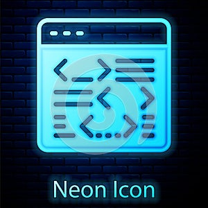 Glowing neon Software, web developer programming code icon isolated on brick wall background. Javascript computer script
