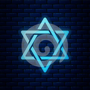 Glowing neon Star of David icon isolated on brick wall background. Jewish religion symbol. Symbol of Israel. Vector