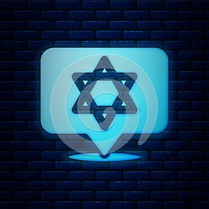 Glowing neon Star of David icon isolated on brick wall background. Jewish religion symbol. Symbol of Israel. Vector