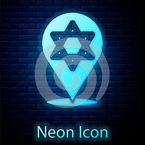 Glowing neon Star of David icon isolated on brick wall background. Jewish religion symbol. Symbol of Israel. Vector