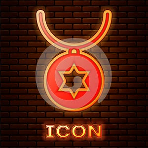Glowing neon Star of David necklace on chain icon isolated on brick wall background. Jewish religion. Symbol of Israel