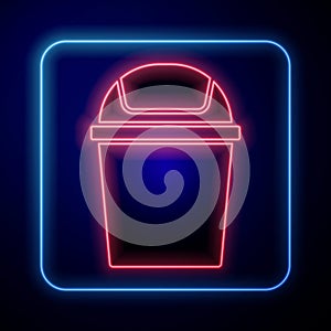 Glowing neon Trash can icon isolated on blue background. Garbage bin sign. Recycle basket icon. Office trash icon