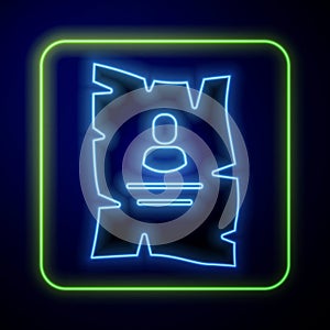 Glowing neon Wanted western poster icon isolated on blue background. Reward money. Dead or alive crime outlaw. Vector