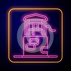 Glowing neon Well icon isolated on black background. Vector