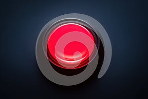 Glowing Red Button in Dark Environment. Minimalistic Background.