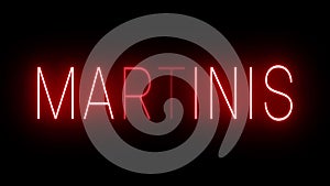 Glowing red retro neon sign for MARTINIS