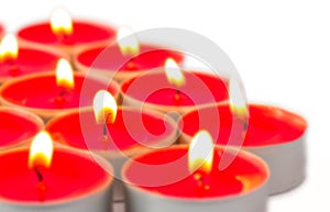 Glowing red tea lights