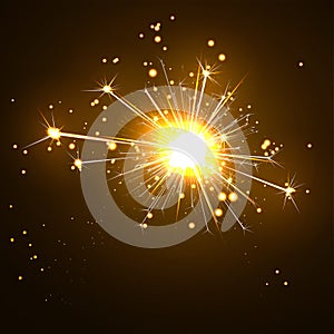 Glowing, Sparkling and Blistering Sparkler on Dark Brown photo