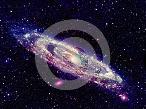 Glowing spiral galaxy in space photo