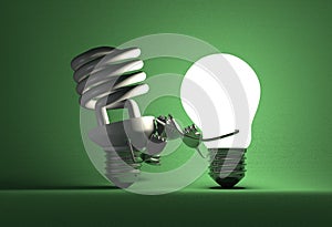 Glowing tungsten light bulb punching switched off spiral one