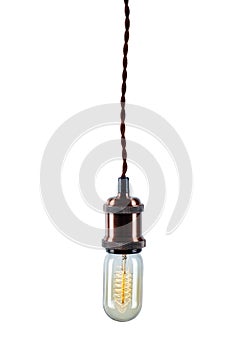 Glowing vintage light bulb isolated on white