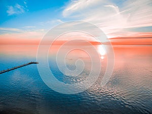 Glowing vivid red sunset over sea.