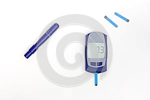 Glucometer with 7.3 result on display