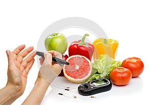 Glucometer. fresh fruits, concept for diabetes, slimming, healthy nutrition and strengthening immunity