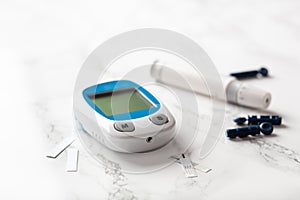 Glucometer ketometer lancet and strips for self-monitoring of blood glucose or ketones level. diabetes or keto diet