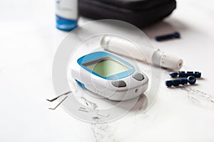 Glucometer ketometer lancet and strips for self-monitoring of blood glucose or ketones level. diabetes or keto diet photo