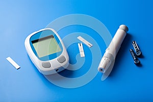 Glucometer ketometer lancet and strips for self-monitoring of blood glucose or ketones level. diabetes or keto diet