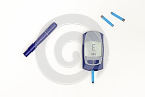 Glucometer with letter E Error result on display
