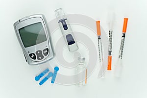 Glucometer and other blood sugar supplies.