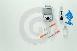 Glucometer and other blood sugar supplies.