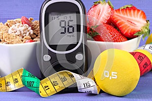 Glucometer with sugar level, healthy food, dumbbells and centimeter, diabetes, healthy and sporty lifestyle