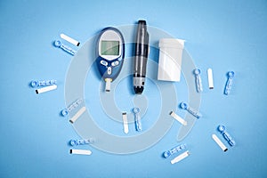 Glucometer with test strips and other objects. Devices for measuring of glucose in the blood