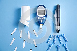 Glucometer with test strips and other objects. Devices for measuring of glucose in the blood