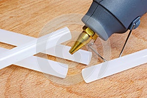 Glue gun closeup with glue plastic rods
