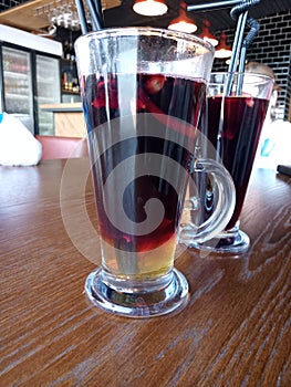 Gluhwein in a glass on the table