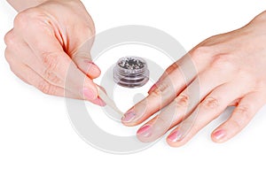 Gluing crystals on nails photo