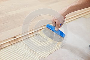 Gluing parquet floor work