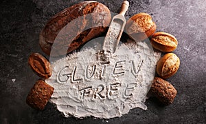 gluten free breads, glutenfree word written and bread rolls on g photo