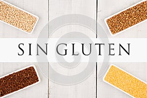 Gluten free cereals in bowls - corn grits, brown buckwheat, red rice, pearl barley with text Sin gluten photo