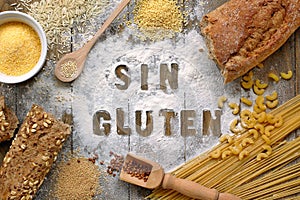 Gluten free flour and cereals millet, quinoa, corn flour polenta, brown buckwheat, basmati rice and pasta with text gluten free in