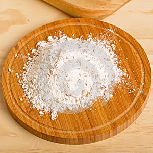 Gluten free flour on wooden table