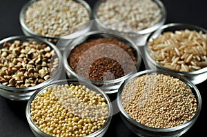 Gluten-free grains on black background