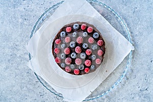 Gluten Free Vegan Chocolate Raw Cake with Raspberries and Blueberries