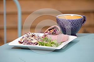 Gluten free wraps with salad and coffee