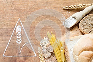 Gluten warning sign symbol with cakes, pastas and bread