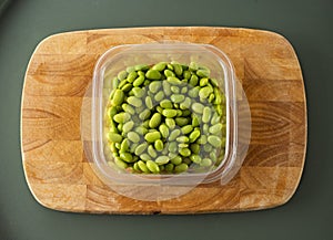 Glycine max - Organic fresh soybeans in the plastic container