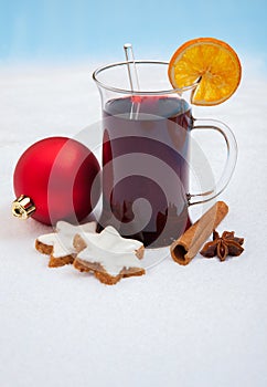 GlÃÂ¼hwein on snow background