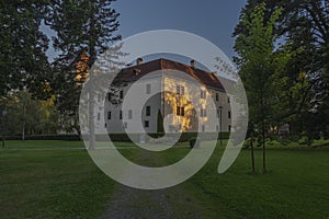 Gmund castle and buildings in summer orange morning