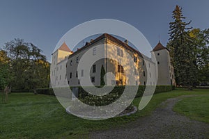 Gmund castle and buildings in summer orange morning