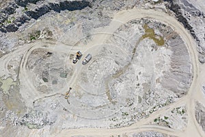 The Gneiss Mine, opencast mine in the countryside in Poland. Mine in a villae from drone aerial drone photo view