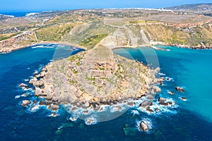 Gnejna and Ghajn Tuffieha bay on Malta island. Aerial view from the height of the coastlinescenic sliffs near the mediterranean photo