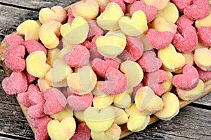 Gnocchi hearts on a wooden cutting board